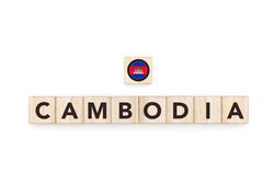 Wooden blocks bearing the name and flag of Cambodia. Cambodian and Asian Culture, national identity, travel, and geography in a copy space design.