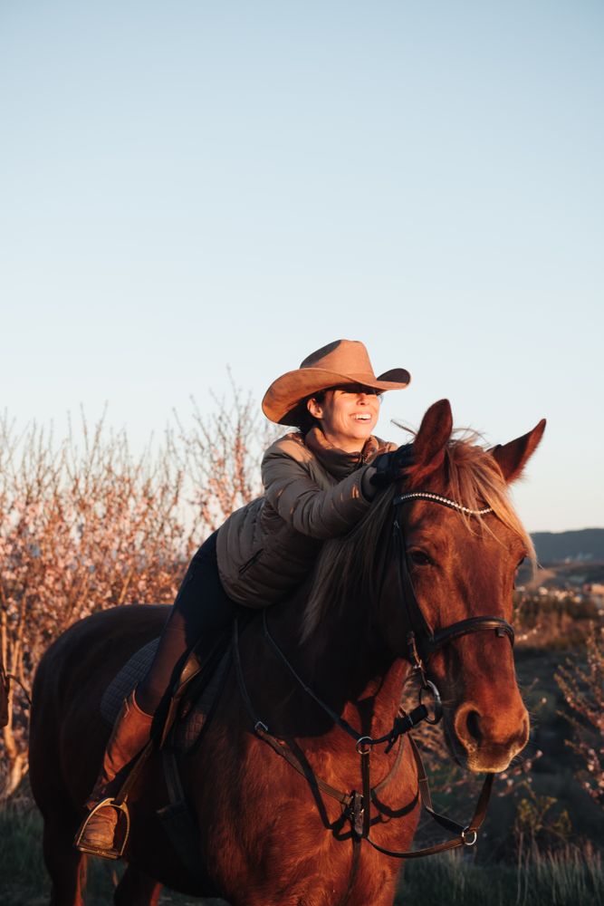 Woman riding horse