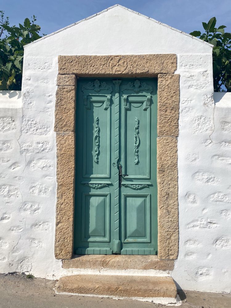 Patmian door with decorative mouldings
