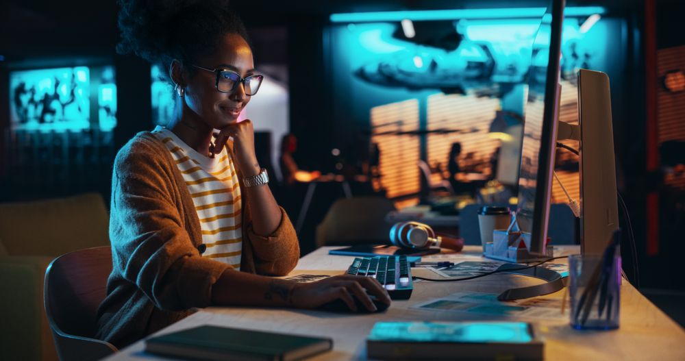 Black Specialist Using Desktop Computer, Analysing Data, Thinking and Solving Problems