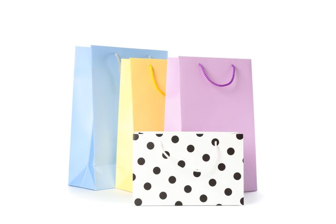 Multicolor paper bags isolated on blank background