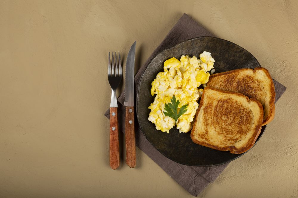 Breakfast. Scrambled egg with toast.