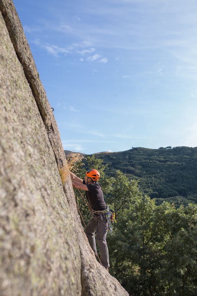 Man climbing a rock