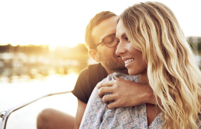 Man closing his eyes leaning in to kiss