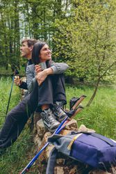 Couple pausing while doing trekking
