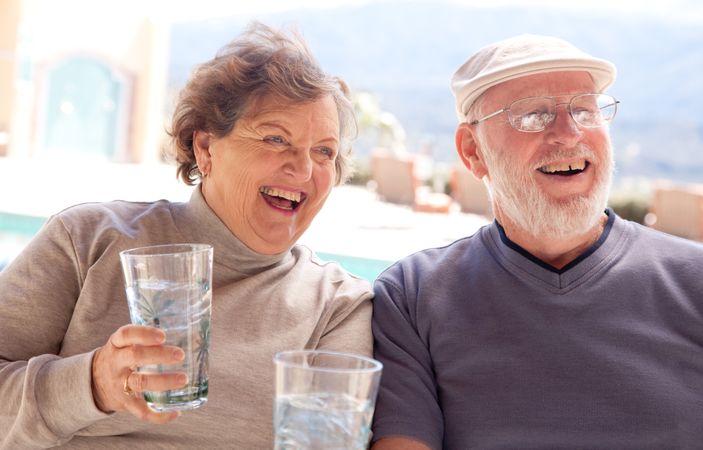 Happy Mature Adult Couple with Drinks