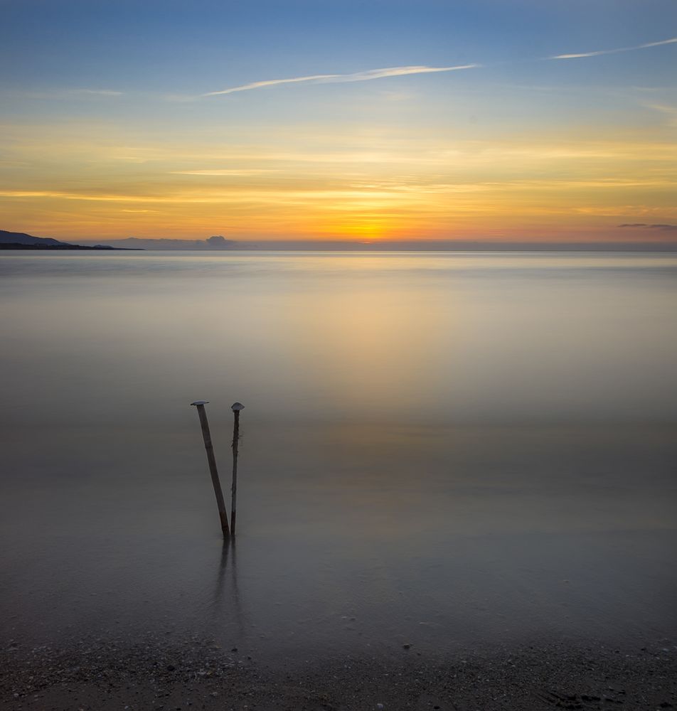 Misty sunrise over ocean