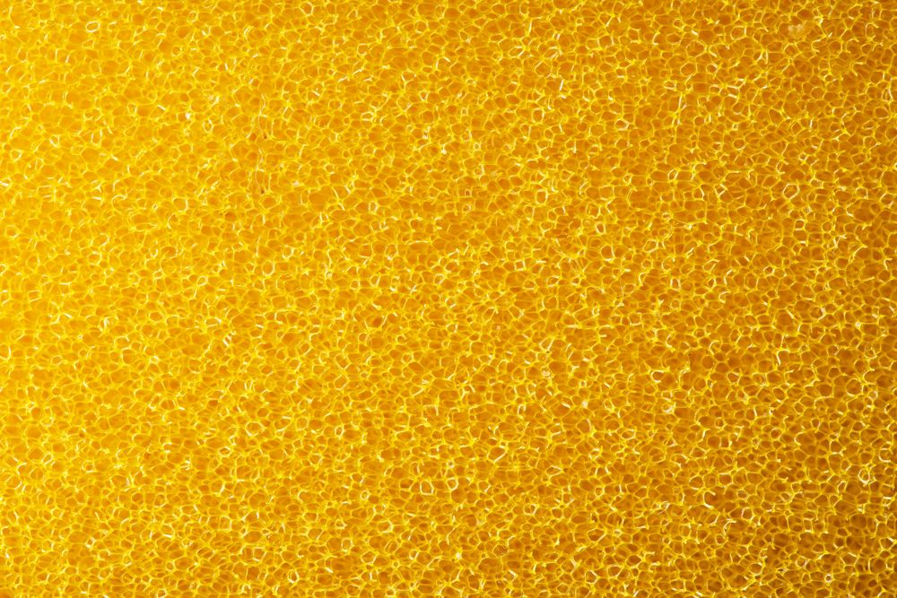 Macro shoot of yellow kitchen sponge