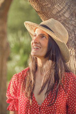 Smiling woman in summer outfit