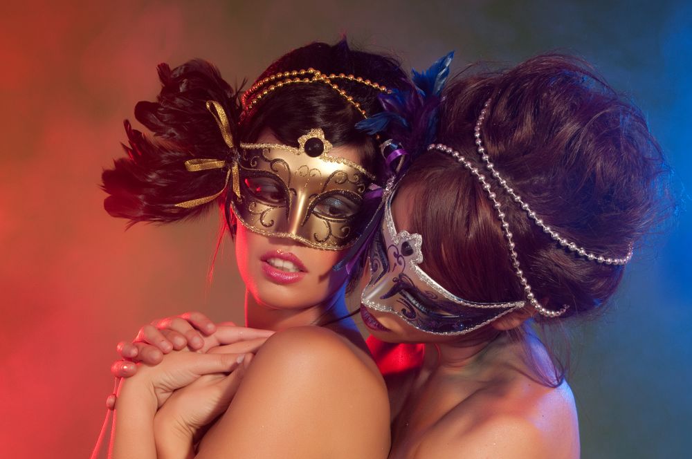 Charming women in masks