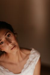 woman sitting in dark room