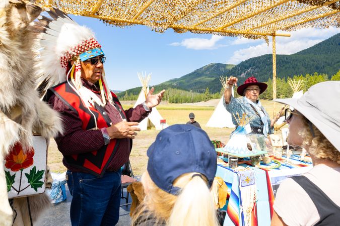 Montana, United States - August 17, 2022: Native man leading event in Yellowstone National Park