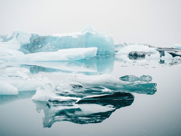 Ice on water between snow