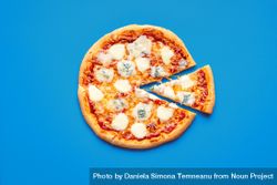 Sliced pizza top view on a blue background 5wZDy0