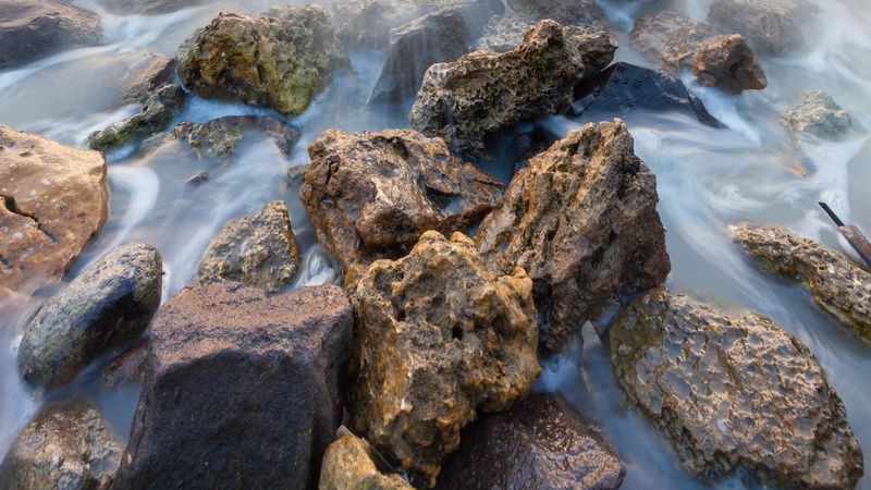 Ocean Wave Through Rocks Slowspeed