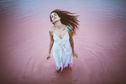 Woman enjoying sea breeze