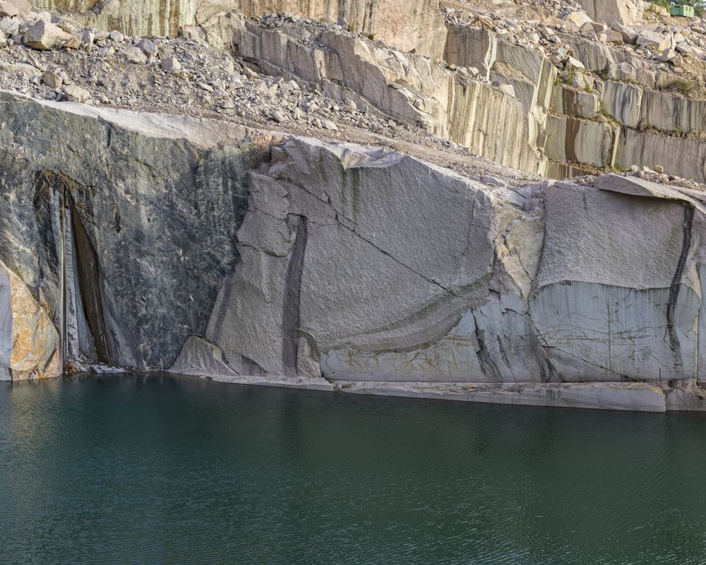 Calm water near stone quarry