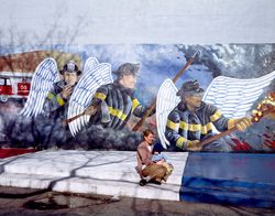 Mother and child in front of a Chicago Firefighter Mural v4mNdb