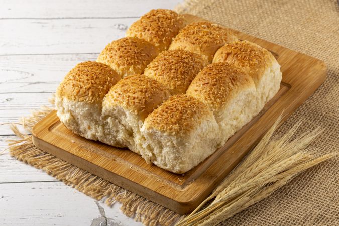 Coconut bread on the wooden table.
