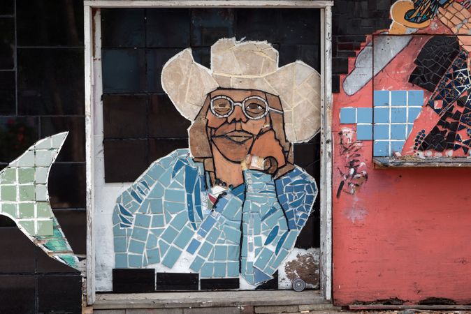 A mosaic of a man in a cowboy hat in the vibrant South Austin neighborhood, Austin, Texas