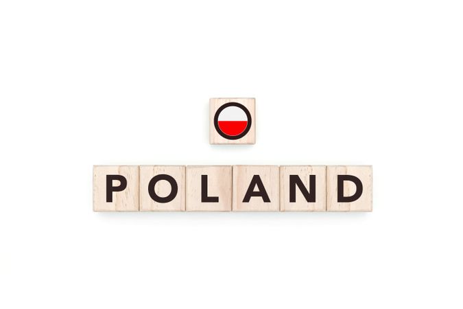 Wooden blocks bearing the name and flag of Poland.