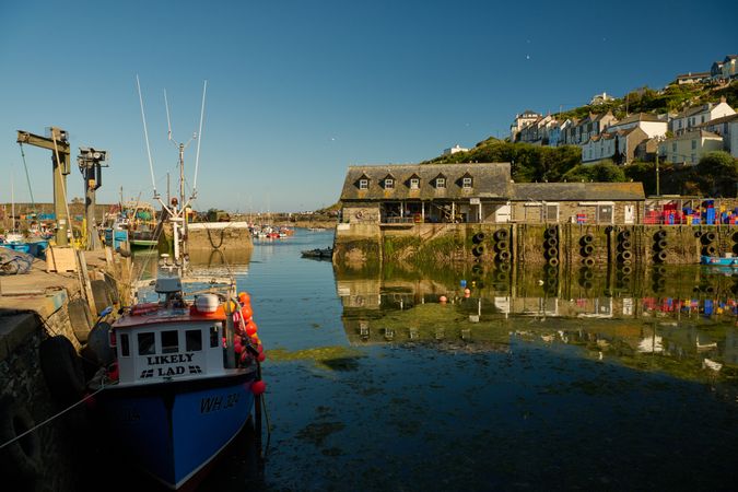 Cornwall docks with boats and houses overlooking