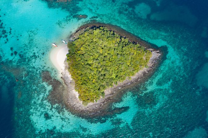 Aerial view of tropical island among blue water