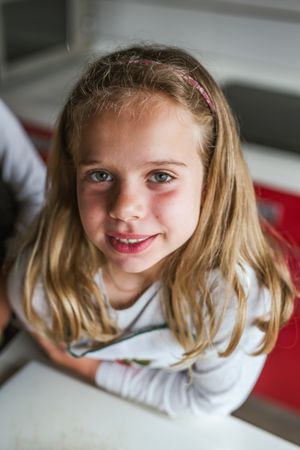 Portrait of young girl looking at camera