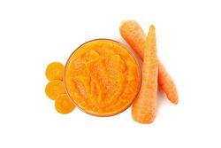 Bowl with healthy baby food isolated on plain background