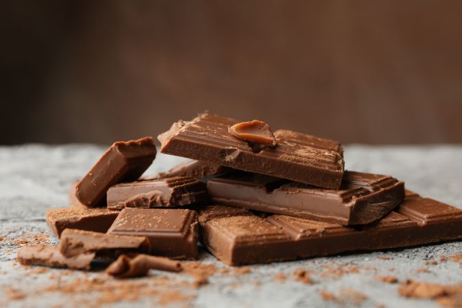 Tasty chocolate on gray background. Sweet food