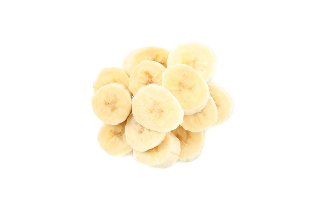 Banana slices isolated on neutral background. Fresh fruit
