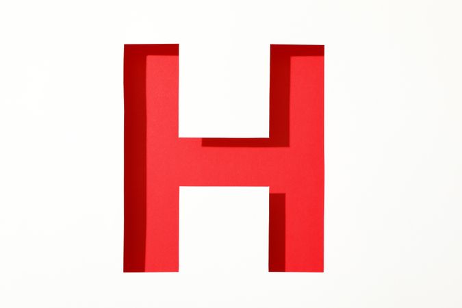 Color letter H on blank background, space for text