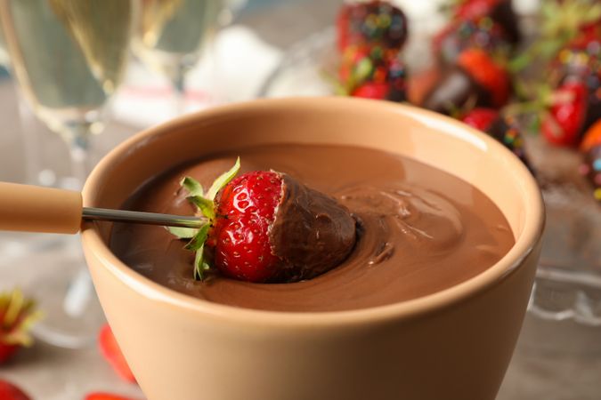 Strawberry in chocolate, close up. Chocolate fondue