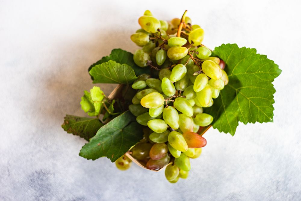 Top view of box of fresh green grapes