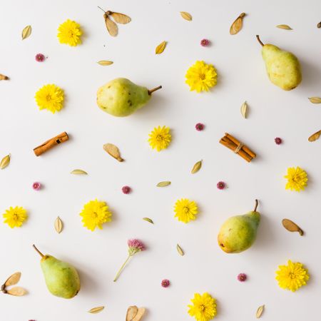 Colorful autumn pattern made of pears, leaves and flowers