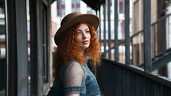 Street portrait of female in hat