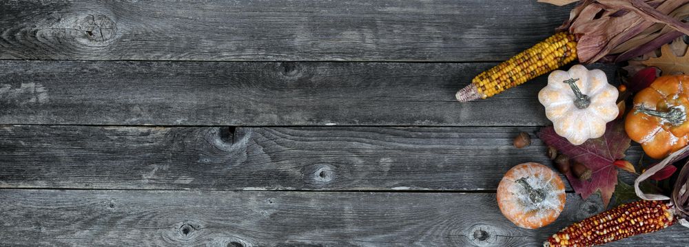 Autumn background decorations on aged wooden planks