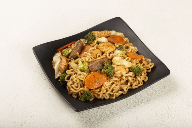 Yakisoba noodles. Yakisoba dish with meat, chicken and vegetables.