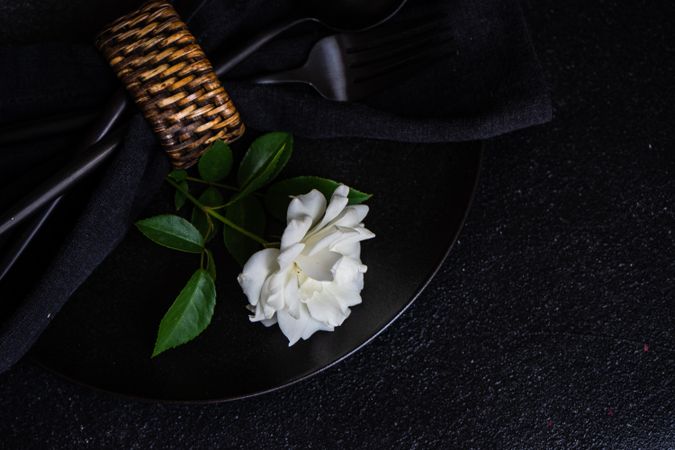 Minimalistic table setting with rose