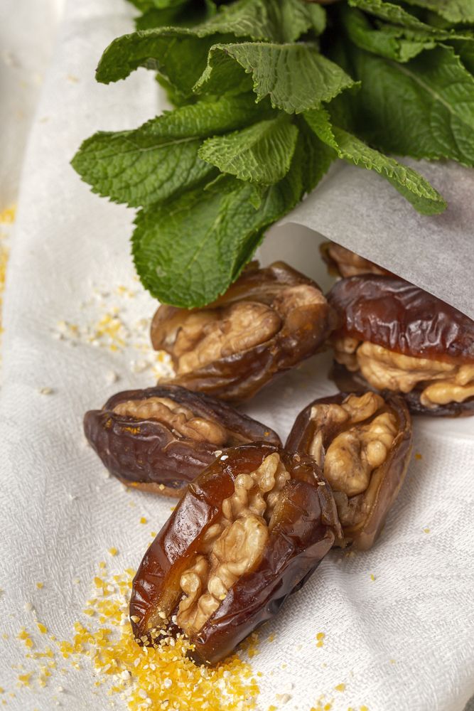 Dates fruits with walnuts, mint and cinnamon for Ramadan