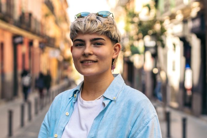 stylish woman with short hair smiling