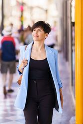 Stylish woman walking down the street