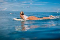 Woman on a surfboard