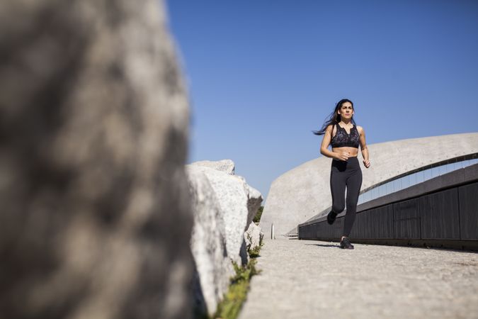 brunette woman running