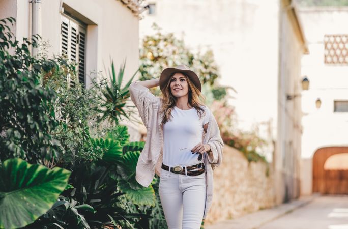 Tourist woman walking on the street