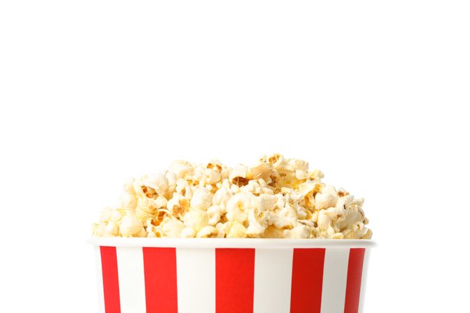 Striped bucket with popcorn isolated on blank background