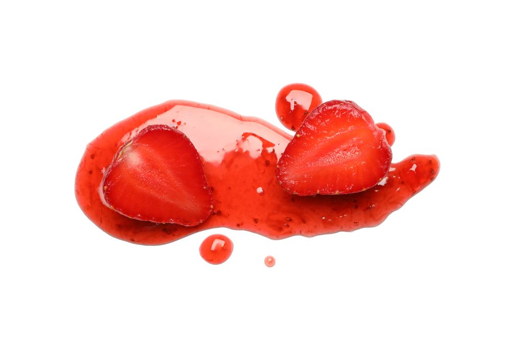 Delicious strawberry jam isolated on plain background