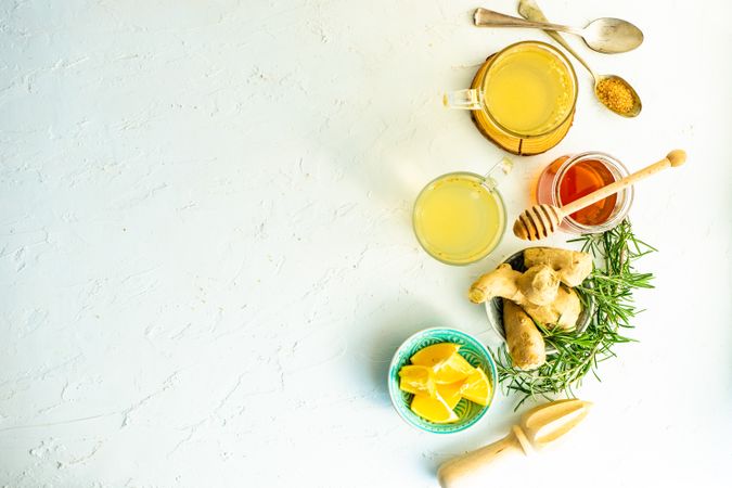 Top view of ginger detox drinks with citrus and honey with copy space