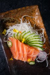 Fresh healthy salmon sashimi with vegetables