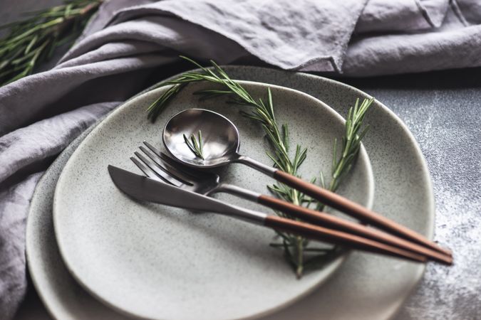 Cutlery set with fresh rosemary